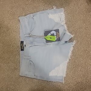 Indigo Rein high rise distressed light wash denim shorts.  Size 15/31
